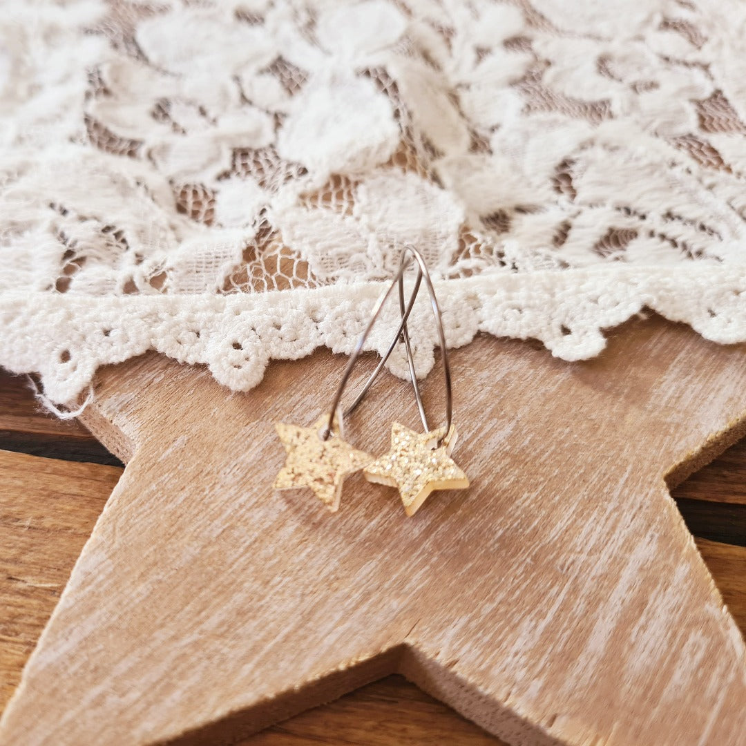 Zilveren ringen met plex ster bedel in lichtgoud glitter