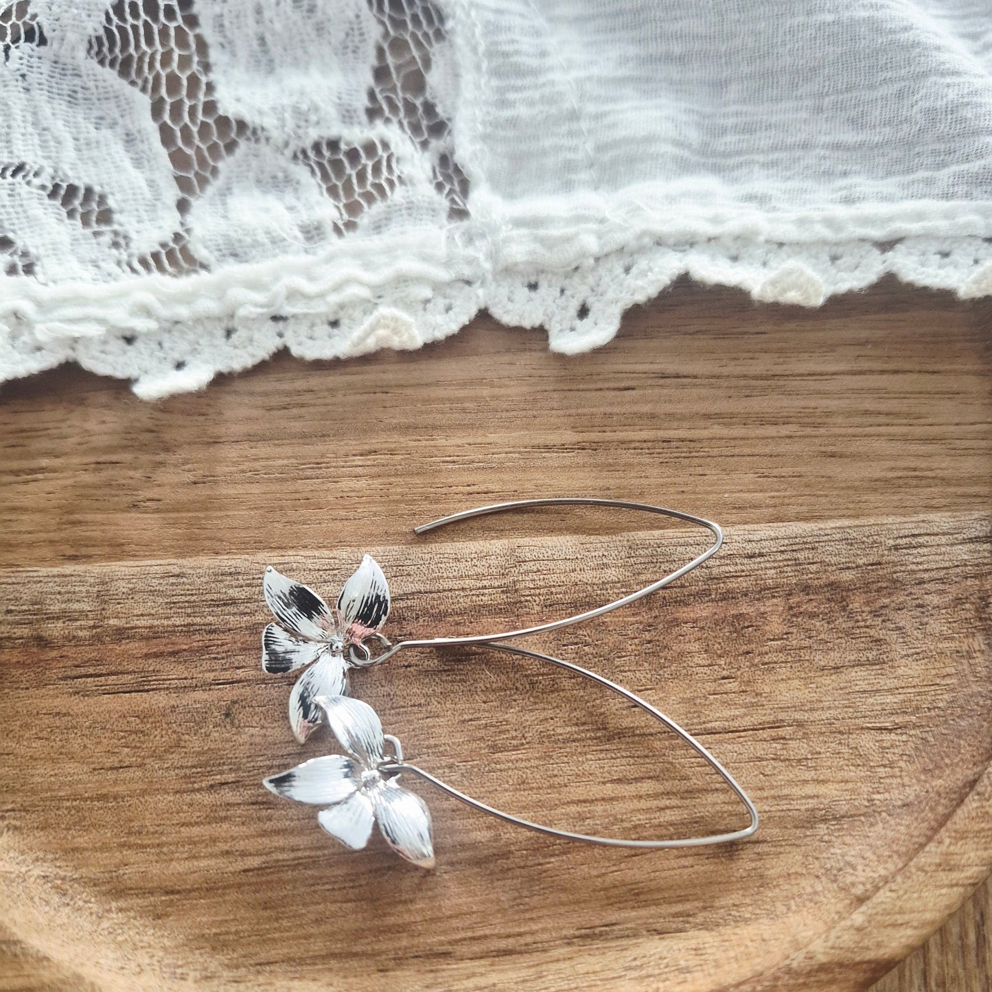 Lange stekers met mooie bloem bedel in zilver