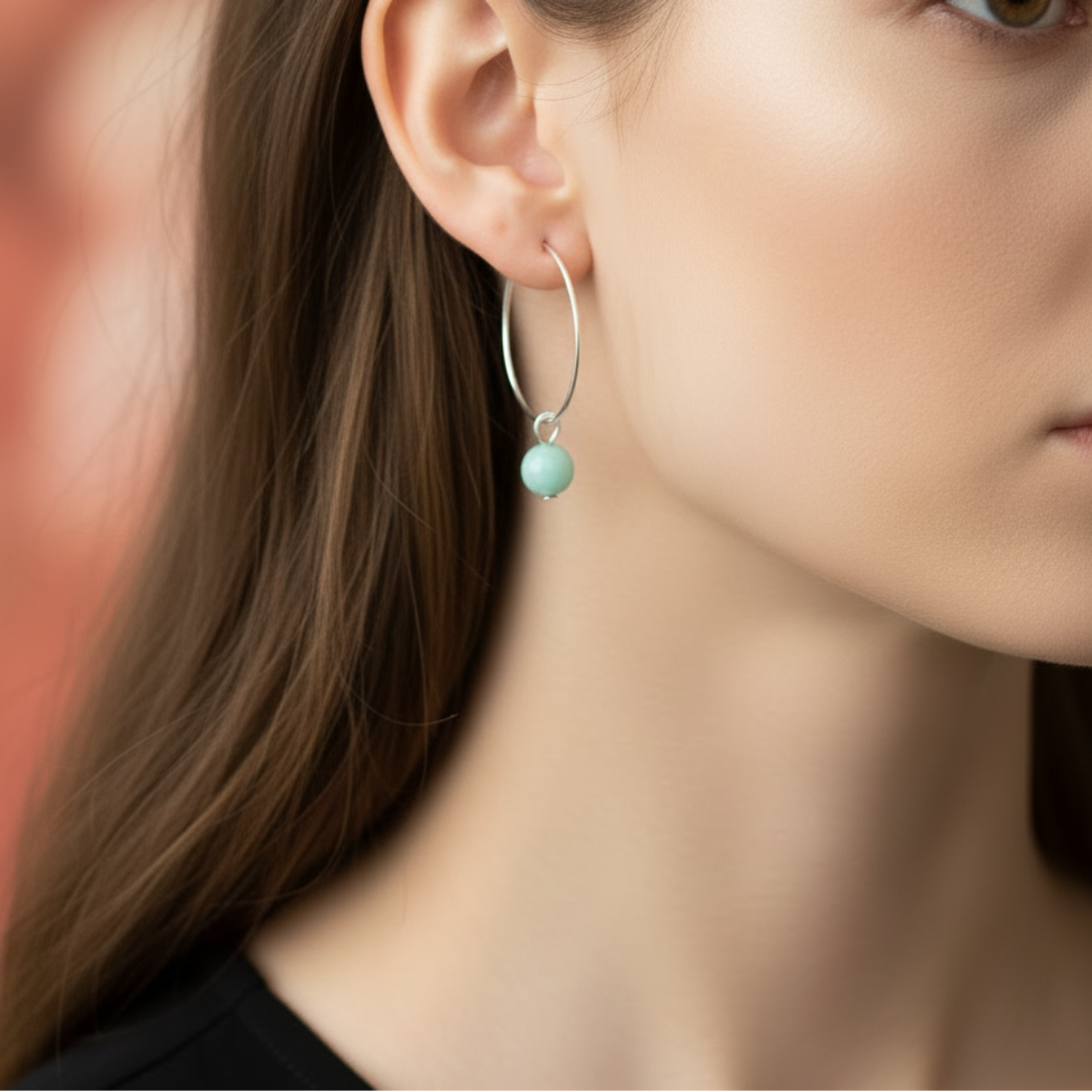 Minimalistische zilveren ringoorbellen met groene aventurijn