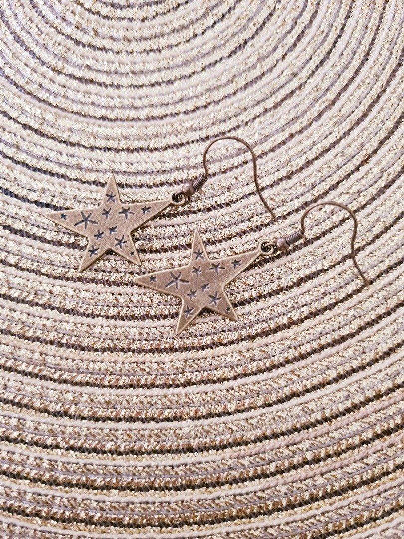 Bronzen steroorbellen met gegraveerd detail