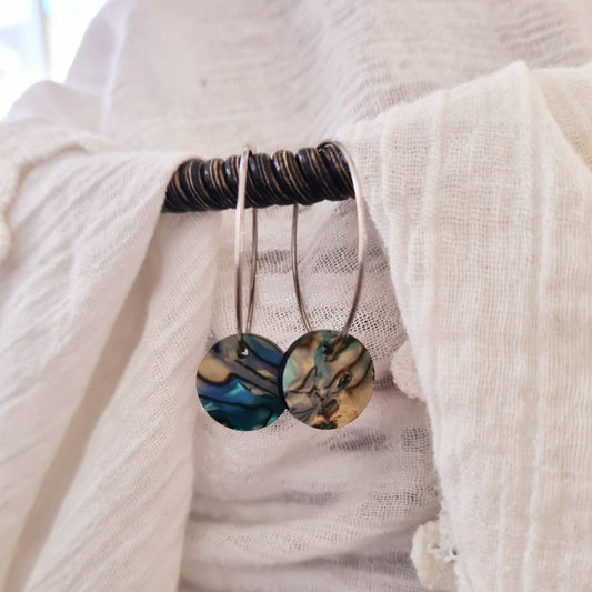 stainless steel ringen met oliekleurige bedel