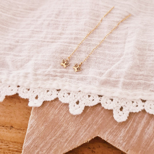 Ketting oorbellen goud met vlinderbedel