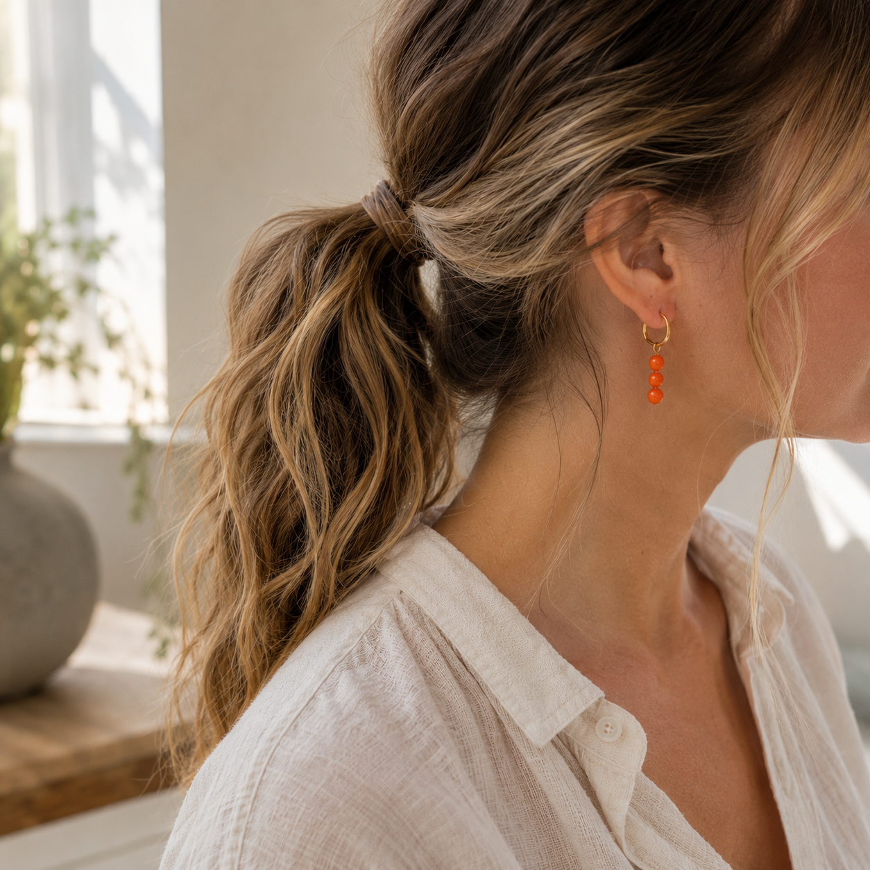 Ringetjes in goud of zilver met oranje kraaltjes