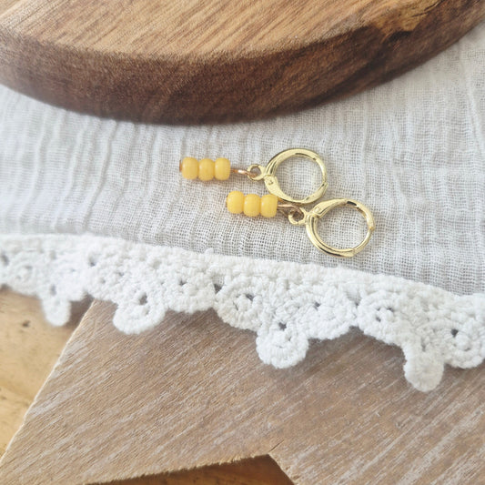 Goudkleurige ringetjes gele rocaille kraaltjes nikkelvrij