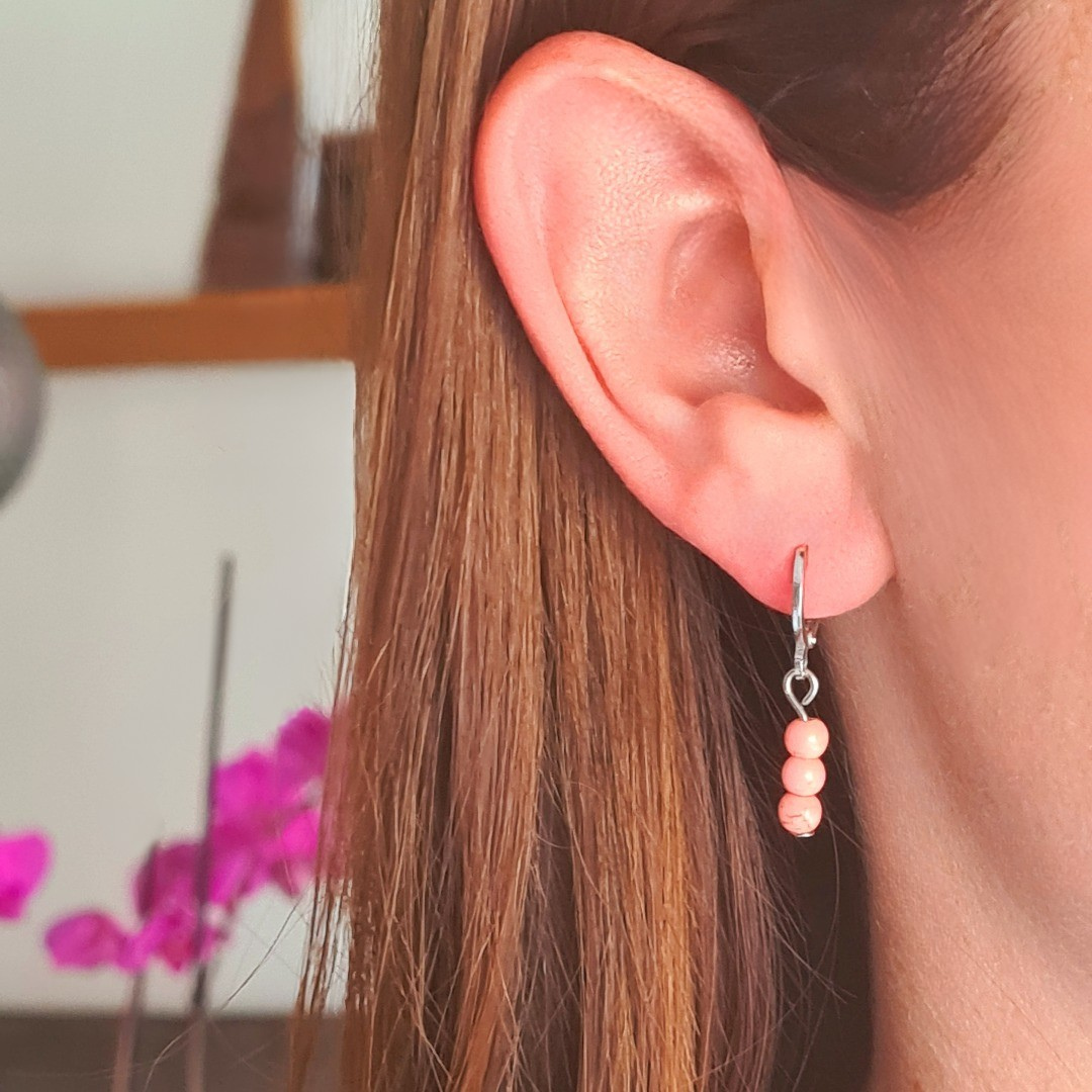 Zilveren ringetjes met roze kraaltjes