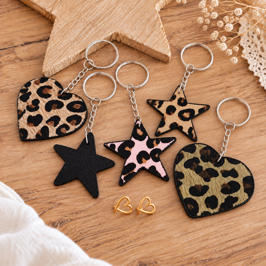 Leopardprint sleutelhangers tassenhangers met hartjesstekertjes