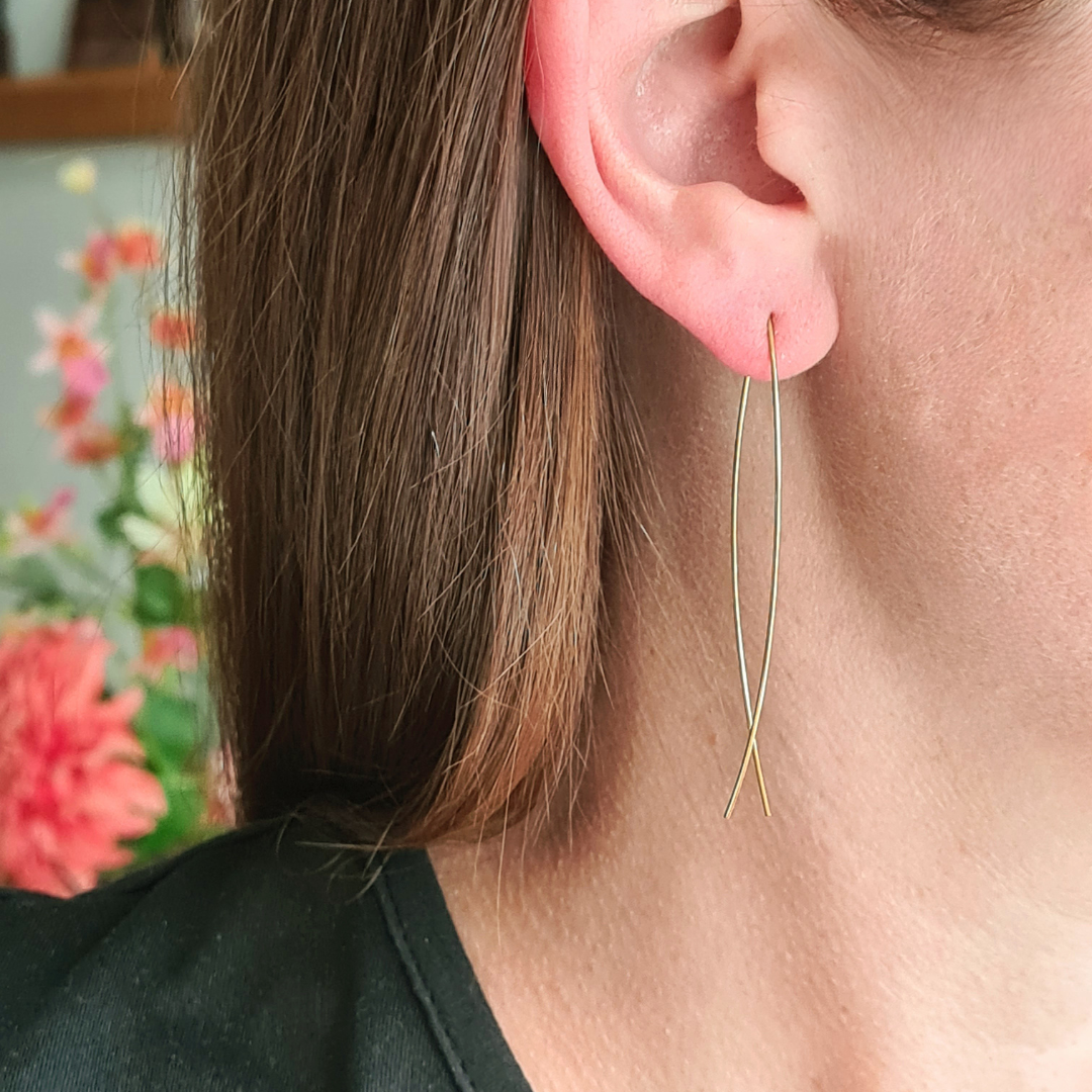 Goudkleurige draadoorbellen van hypoallergeen stainless steel