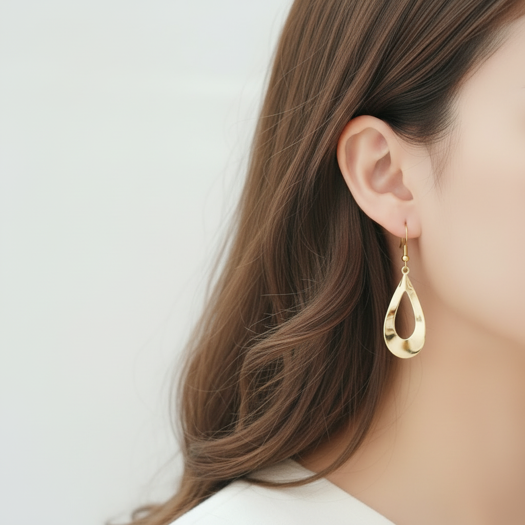 Gouden druppel oorbellen clean