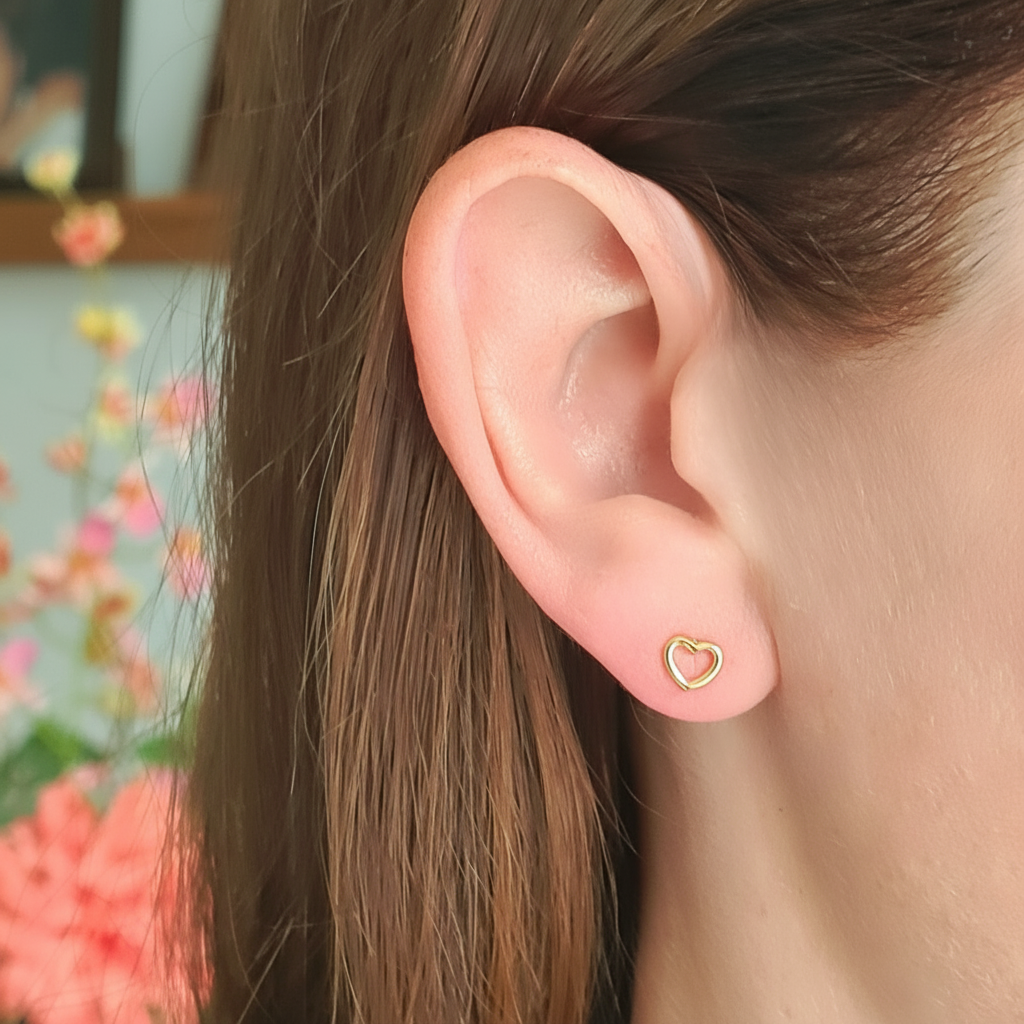 Gouden hartjes oorbellen mooiere huid