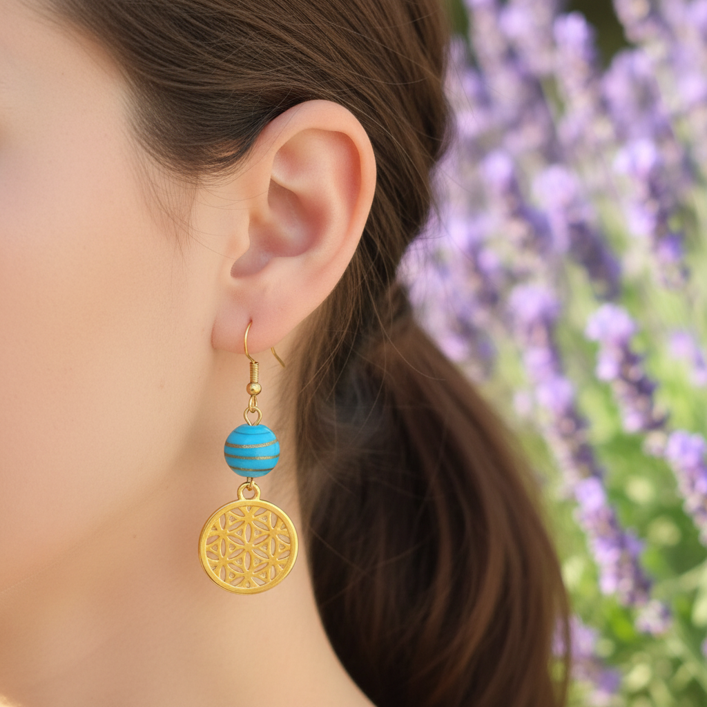 Gouden oorbellen turquoise kraal filigree