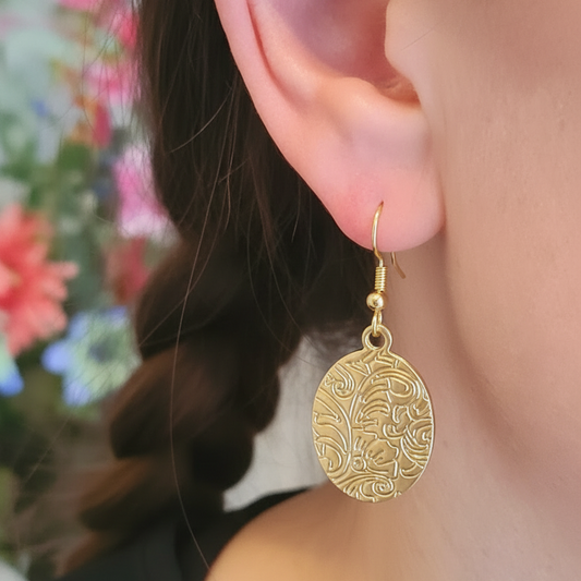 Gouden ovale oorbellen - grotere munt