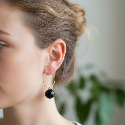 Gouden ring obsidiaan Nederlands