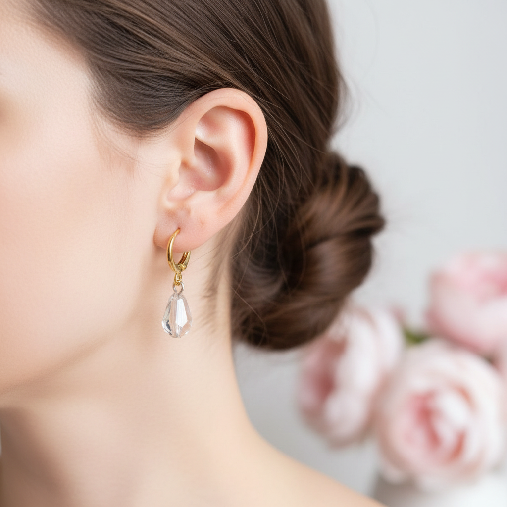 Gouden ringetjes gefacetteerde druppels