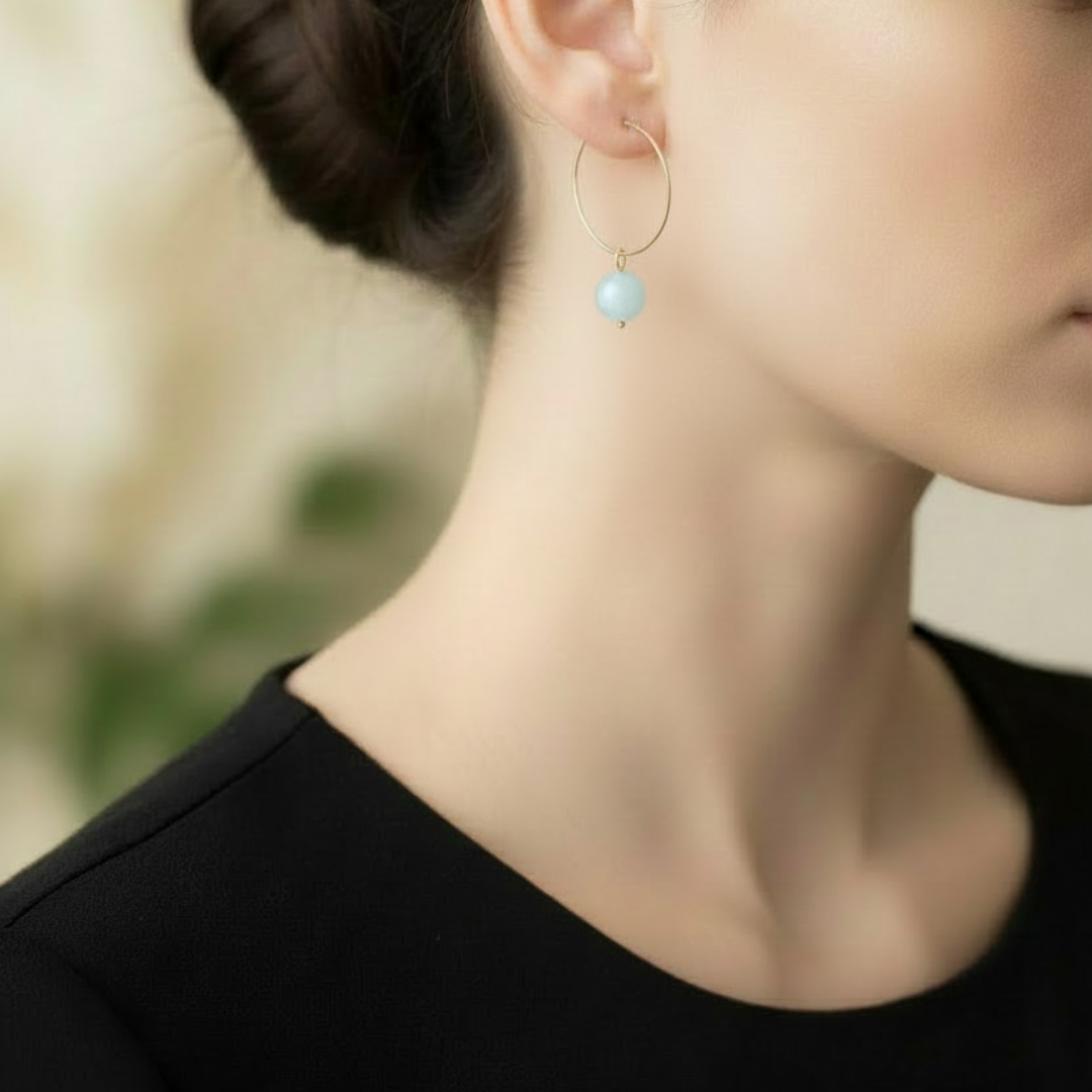 Gouden aquamarijn steentje op stainless steel ring