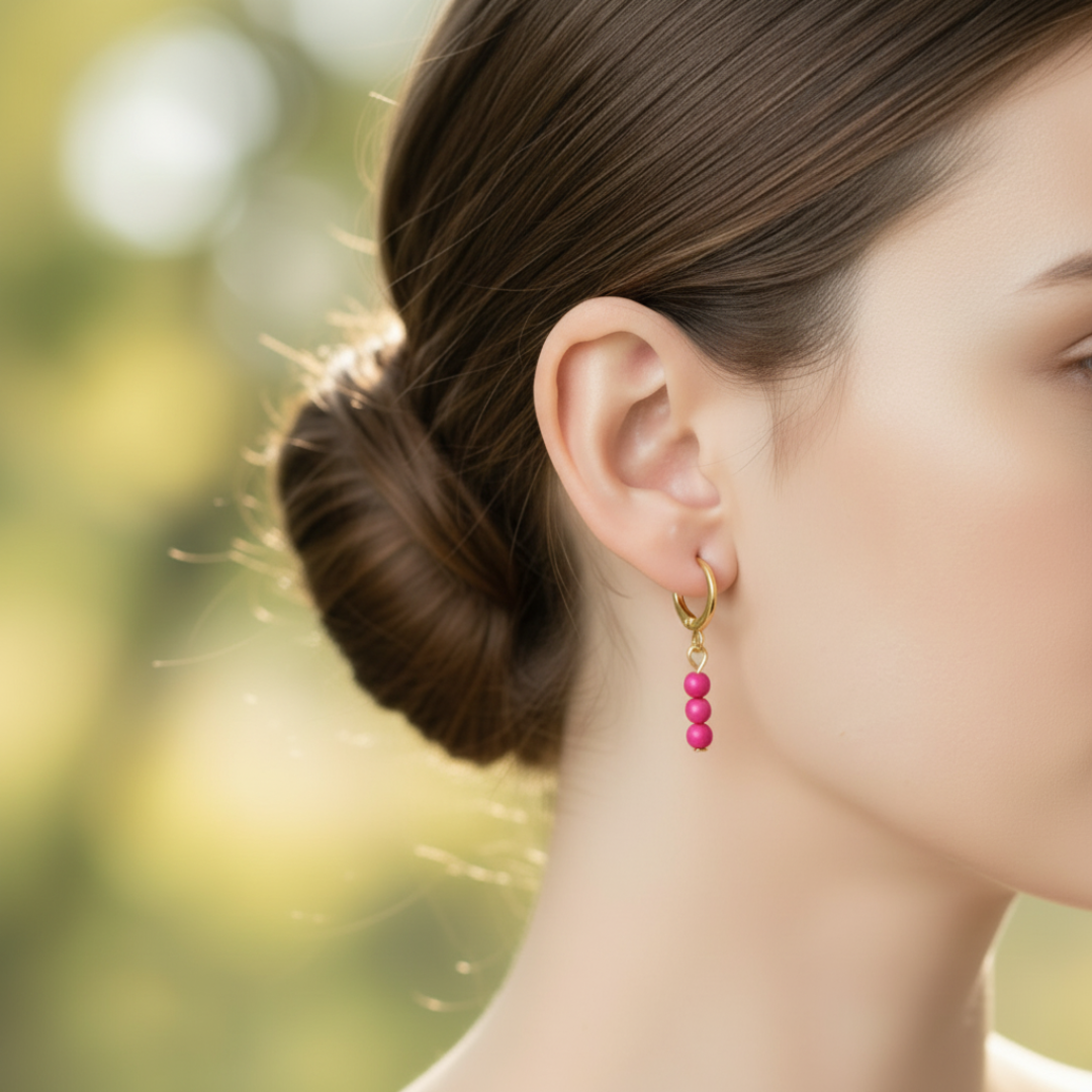 Gouden ringetjes hotpink kraaltjes 