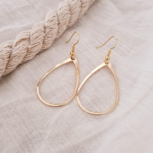 Goudkleurige druppel oorbellen met open ovaal design, nikkelvrij roestvrij staal, elegante hangers voor dames