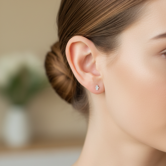 Minuscule zilveren hamsa studs