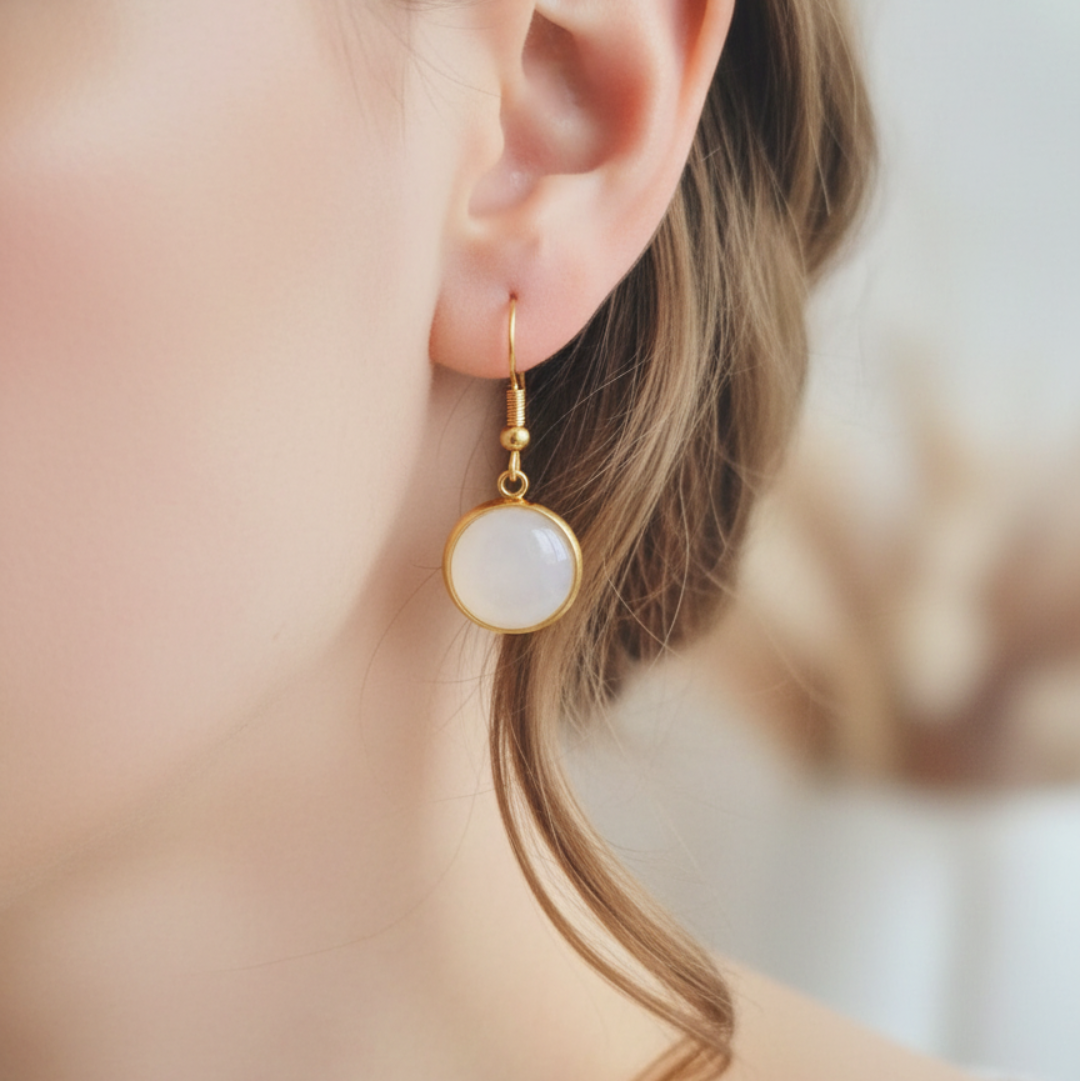 Oorbellen witte steen goud compleet