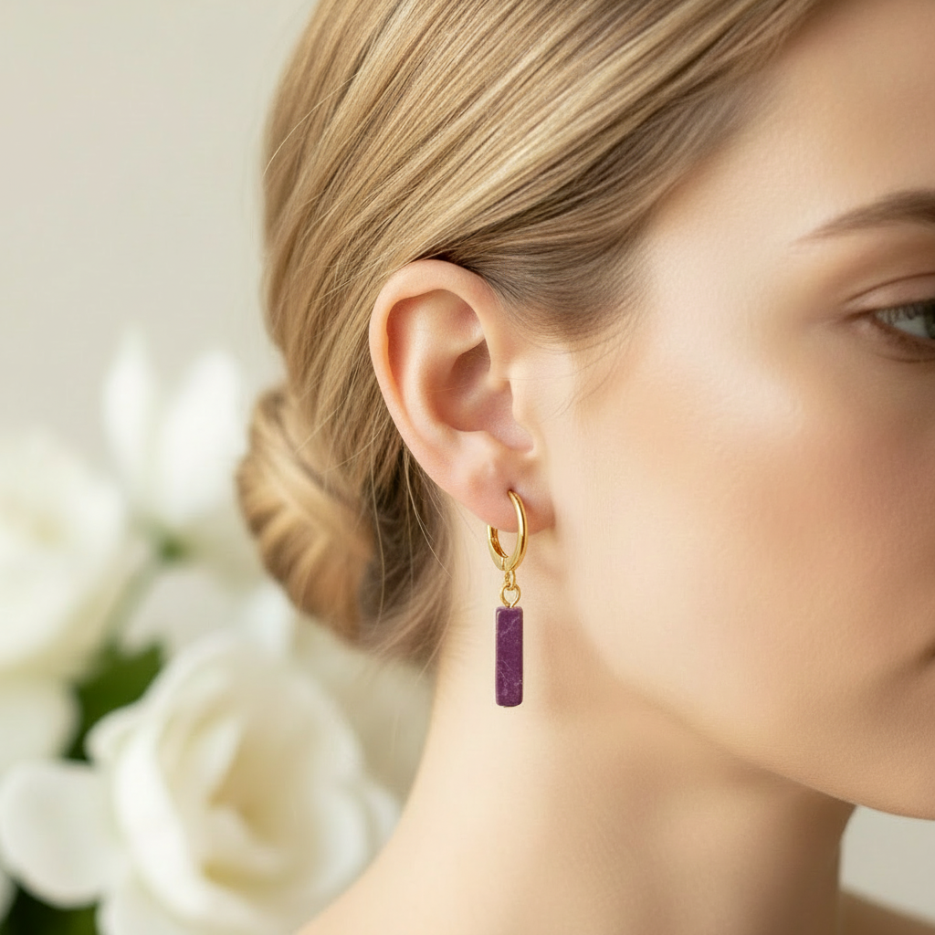 Paarse regalite staafjes goud op ringetje