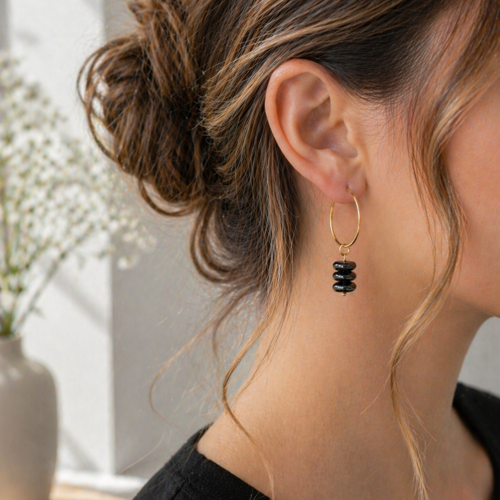 Gouden ringen oorbellen met donkere hematiet kraaltjes stainless steel