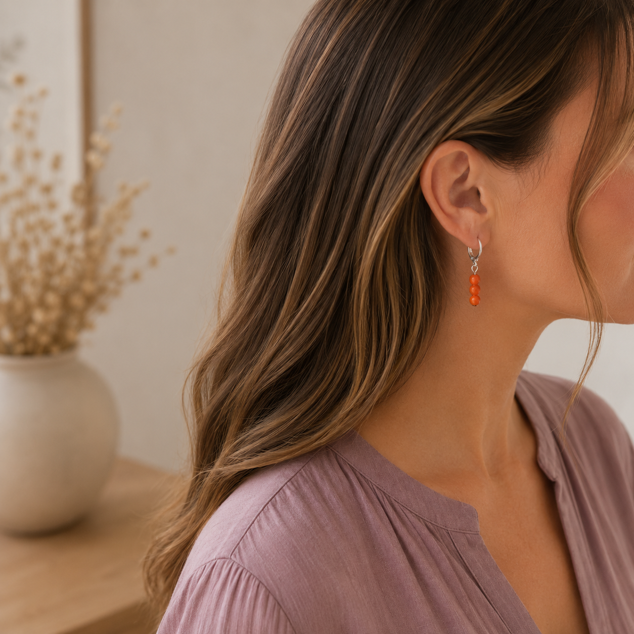 ringetjes in zilver met oranje kraaltjes