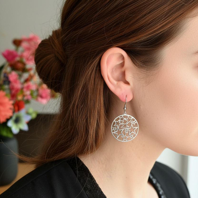 Ronde zilveren oorbellen met sterren uitsnede - groter geen oog