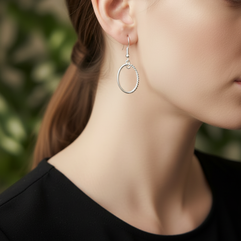 Silver double oval earring - green background