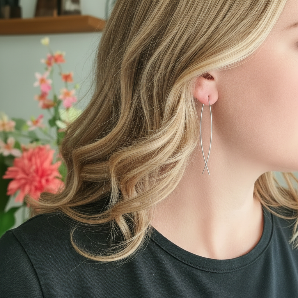 Zilveren draadoorbel met krul