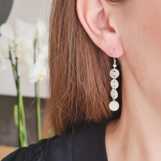 Zilveren lange oorbellen mooiere huid