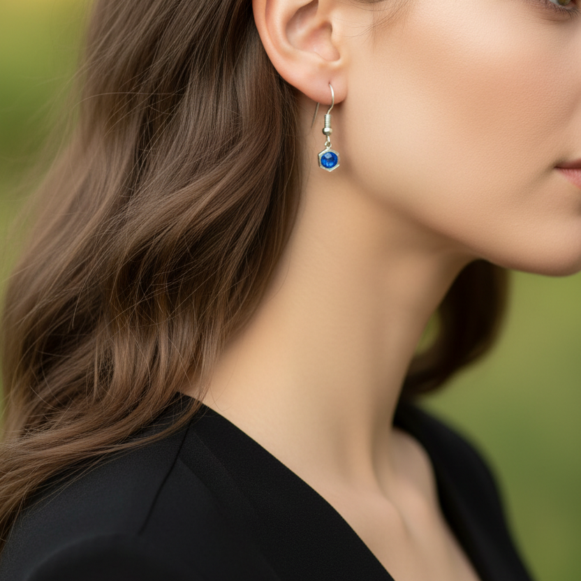 Zilveren oorbellen met blauwe steen
