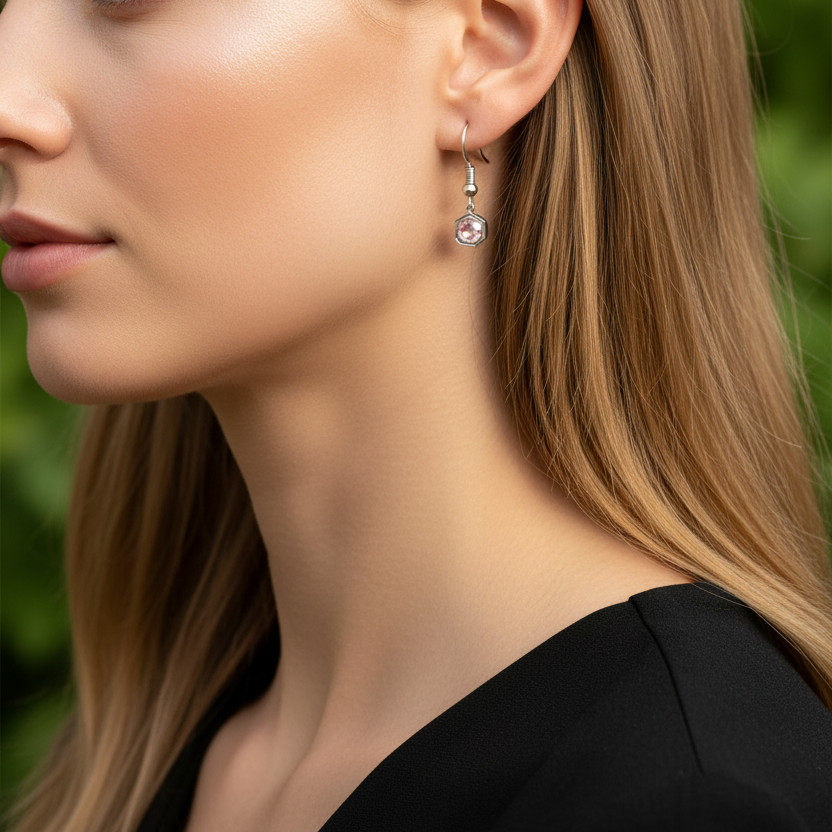 Zilveren oorbellen met lichtroze steen