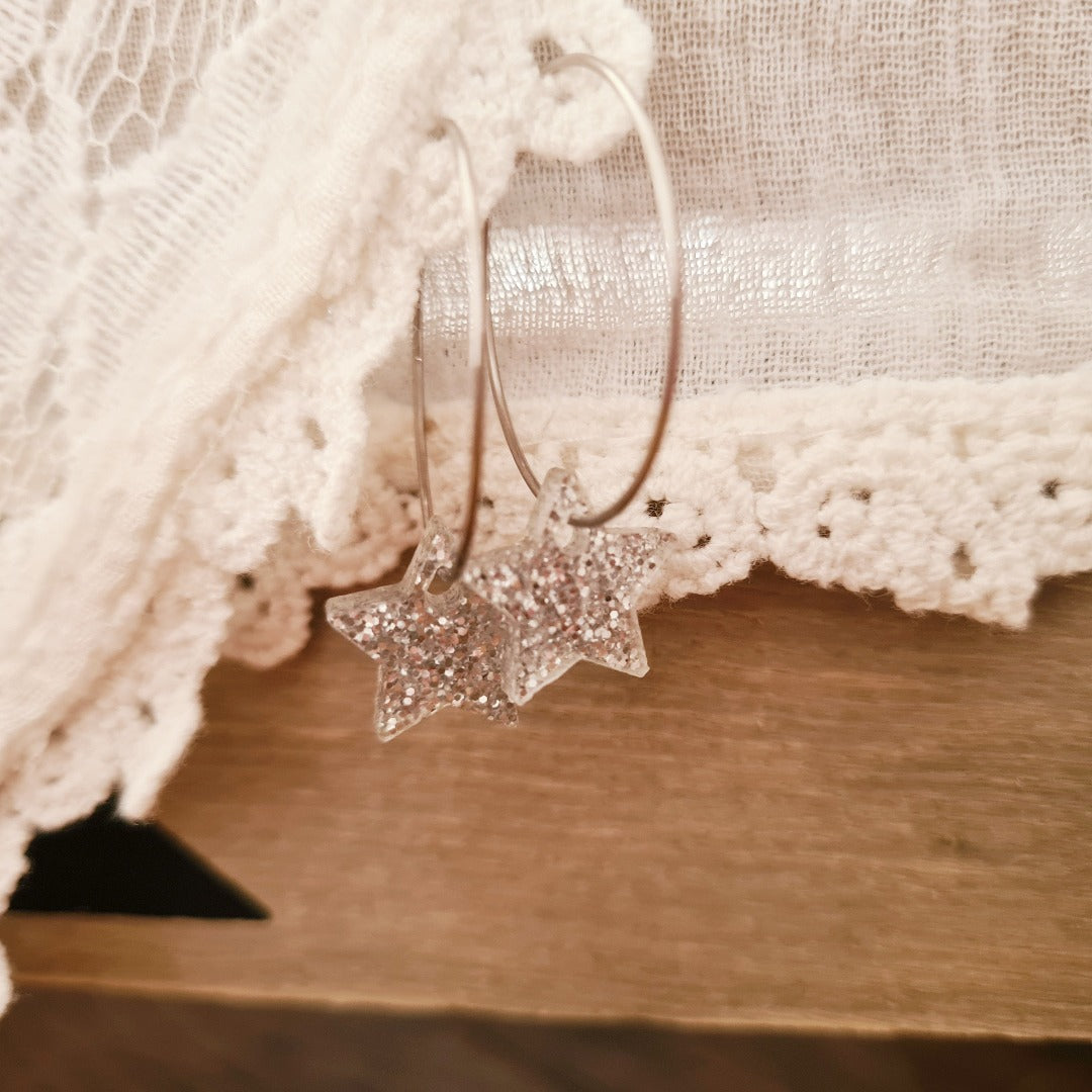 Zilveren ringen met plex ster bedel in zilver glitter