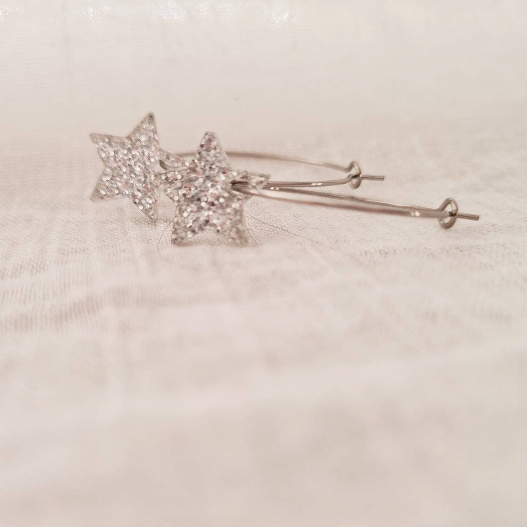 Zilveren ringen met plex ster bedel in zilver glitter